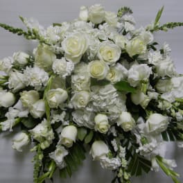 Large white floral spray with roses and carnations