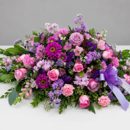 Compassionate Lavender Blooms Casket Spray