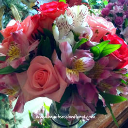 Bouquet of pink and red roses with striped alstroemeria
