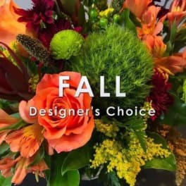 Fall bouquet with orange roses and mixed autumn flowers