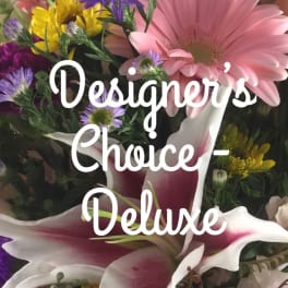 Mixed bouquet with pink lilies, gerbera daisies, and purple flowers