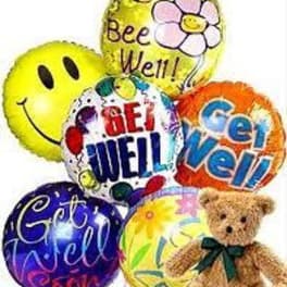 Cluster of colorful balloons with a teddy bear and cheerful messages