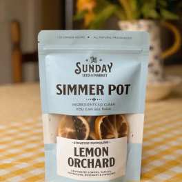 Package of lemon orchard stovetop potpourri on a table