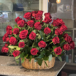 Long stem red roses in basket
