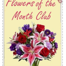 Bouquet of red roses and pink lilies with purple flowers