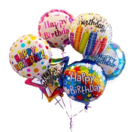 Cluster of birthday balloons with colorful printed designs