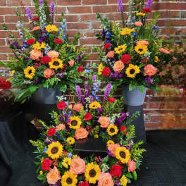 Eckert Florist's Bright Memorial Urn Arrangement (Photo Represents Premium Upgrade) *Our Local Delivery Only
