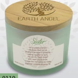 Mint-green candle in a glass jar with a wooden lid