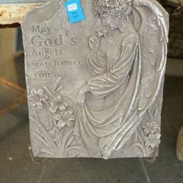 Stone angel plaque with the words "May God's Angels watch over you."