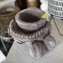 Decorative ceramic planter shaped like stacked baseballs