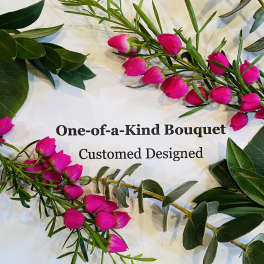 Pink flower sprigs arranged around text on a white background