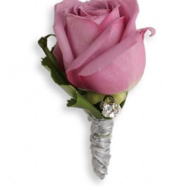 Pink rose boutonniere with silver ribbon wrap and rhinestone accent