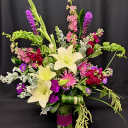 Romantic Bouquet of lilies and dripping amaranth
