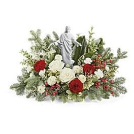 White and red floral arrangement with a small statue centerpiece