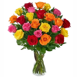 Bouquet of multicolored roses in a clear glass vase
