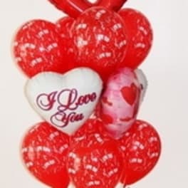 Heart-shaped red balloon bouquet with an "I Love You" balloon