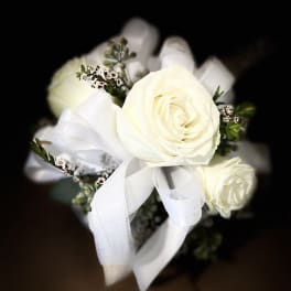 White rose bouquet with a sheer white ribbon
