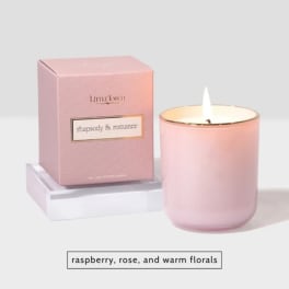 Pink scented candle in a glass jar with matching box