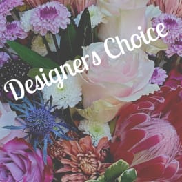 Mixed bouquet with a pale pink rose, purple chrysanthemums, and a blue thistle bloom