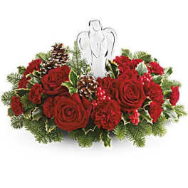 Red rose centerpiece with an angel figurine and pinecones