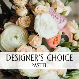 Pastel bouquet of roses and white ranunculus with text overlay