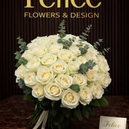 Bouquet of cream roses with eucalyptus accents and ribbon