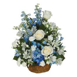 Blue and white floral arrangement in a wicker basket