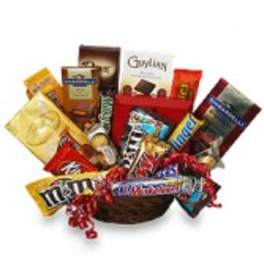 Basket filled with assorted candy bars and snack packs