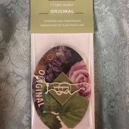 Packaged scented air freshener with a floral print