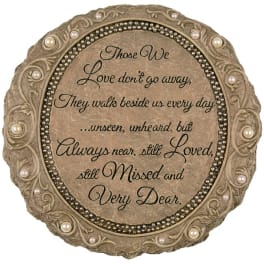 Round memorial plaque with a sympathy quote and pearl-like accents