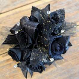 Black rose bouquet with sheer black ribbon and gold accents