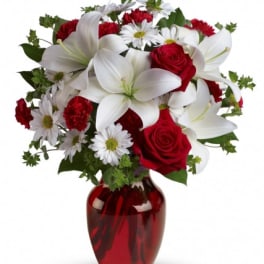 Boldly Bashful red roses with white lilies