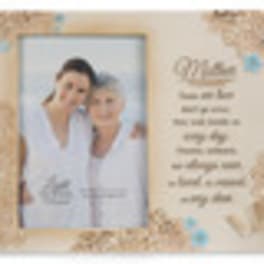 Blurred wedding photo card with a couple and text on a beige floral background
