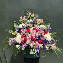 Large mixed bouquet with pink, white, purple, and yellow flowers