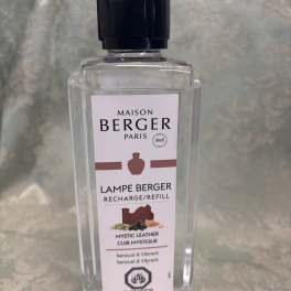 Clear bottle of Maison Berger Paris lamp refill with a black cap
