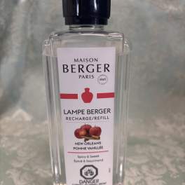 Clear bottle of Maison Berger Paris lamp refill with a black cap
