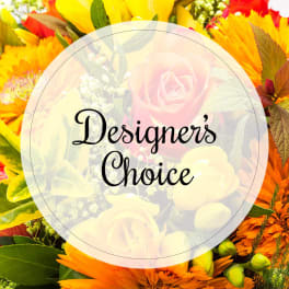 Designer’s Choice floral arrangement with yellow and orange blooms