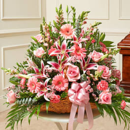 Pink mixed flower basket with roses, lilies, and gerbera daisies