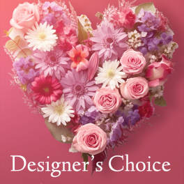 Heart-shaped bouquet of pink and purple flowers on a pink background