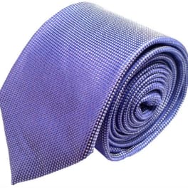 Rolled blue patterned necktie on a white background
