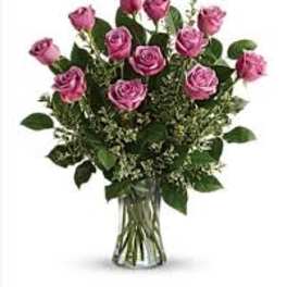 Dozen Lavender Roses In Vase