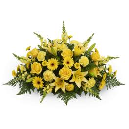 Yellow floral arrangement with roses, lilies, and daisies