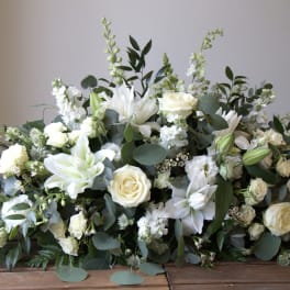 White Serenity Casket Spray