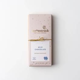 Box of milk chocolate tied with a gold ribbon