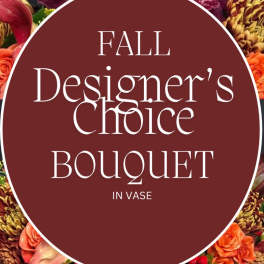 Fall designer's choice bouquet in a vase with mixed autumn flowers