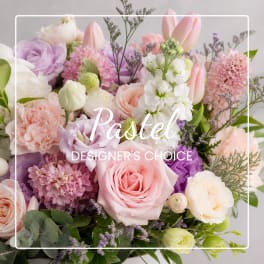 Pastel bouquet with pink roses, tulips, and mixed blooms