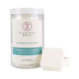 Scented candle in a clear jar with a white lid