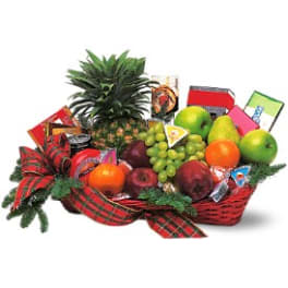 Fruit basket with assorted fruit and wrapped chocolates in a red basket