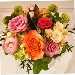 Mixed bouquet of roses, peonies, and green hydrangeas