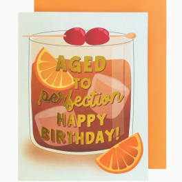 Birthday card with a cocktail glass and orange slices